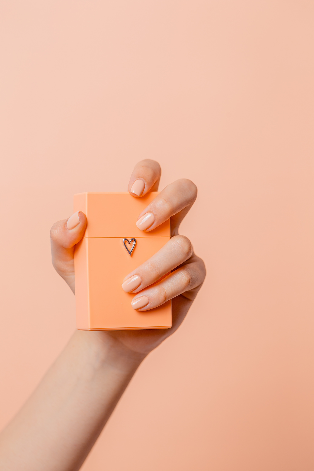 Hand Holding a Romantic Gift Box 